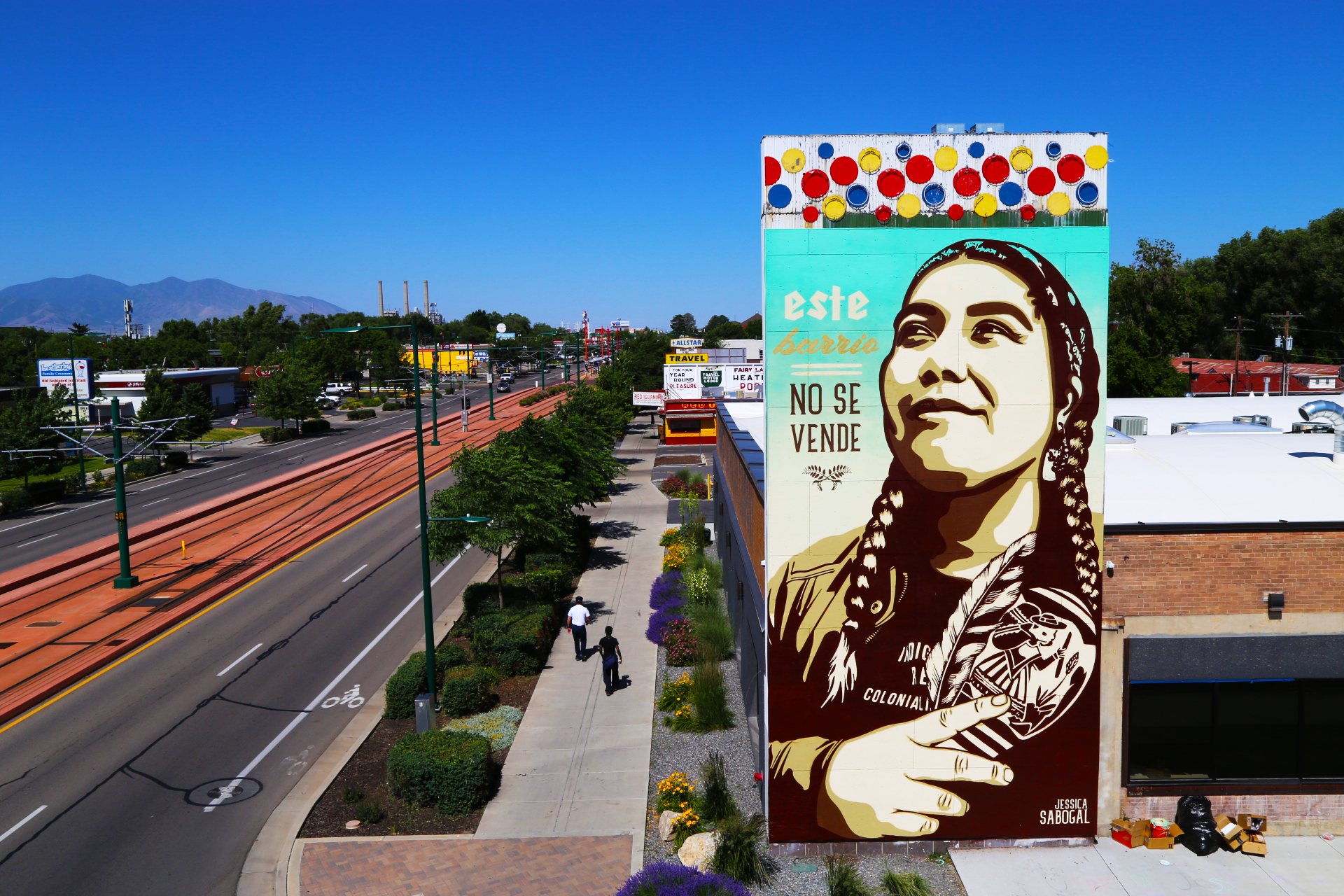 Este Barrio No Se Vende (This Neighborhoodis Not for Sale), mural and photograph by Jessica Sabogal.