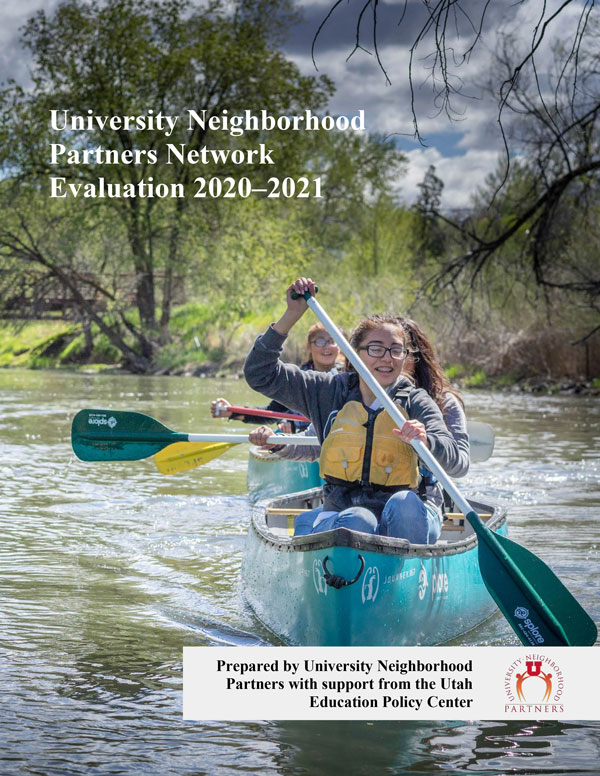 Cover of evaluation report with picture of young people canoeing on a river